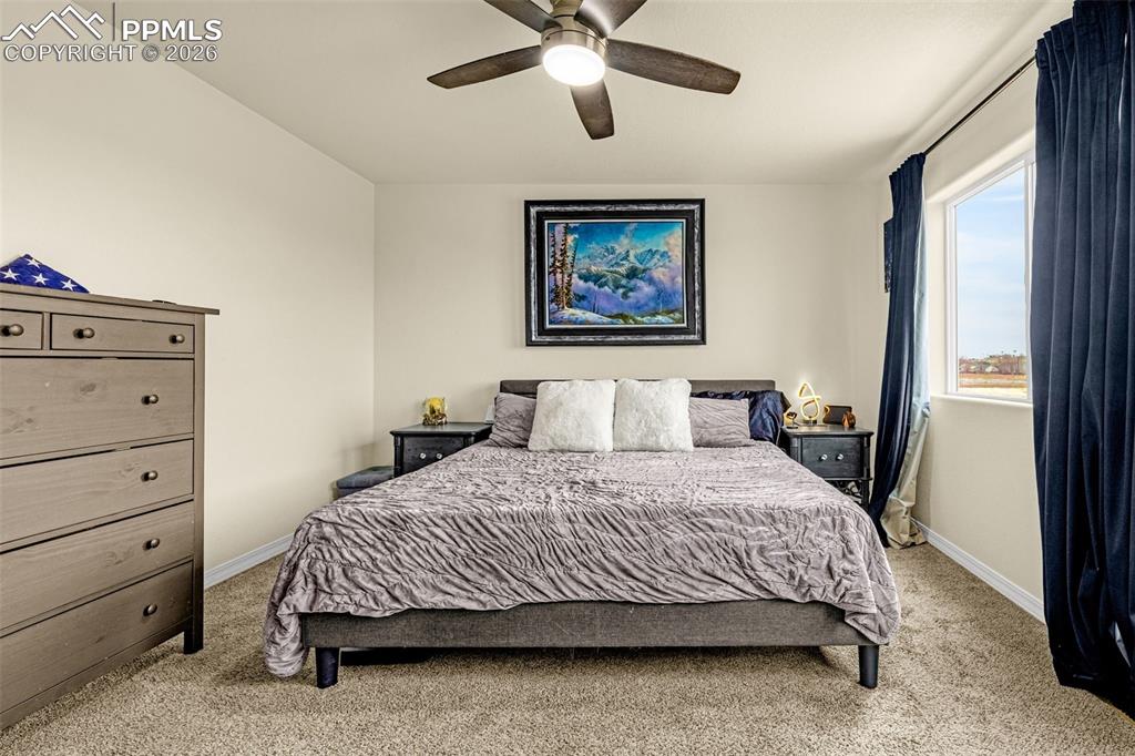 Image 17 of 33: Main Bedroom on the top floor with plenty of space and offers plenty of na