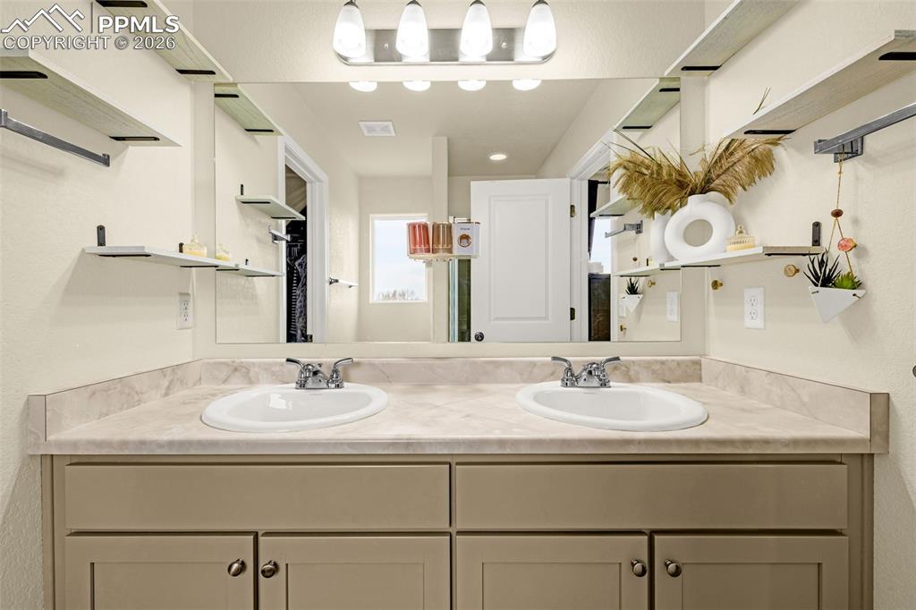 Image 20 of 33: Primary Bathroom also includes Dual Vanity sink