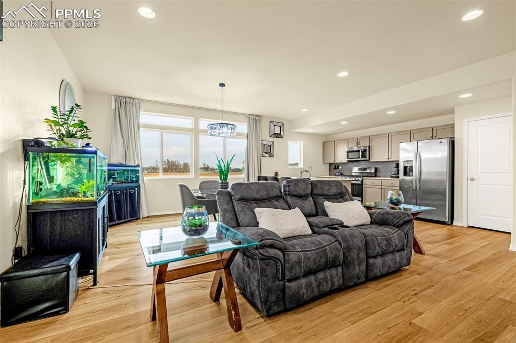 Image 6 of 33: Family room as seen from the other staircase
