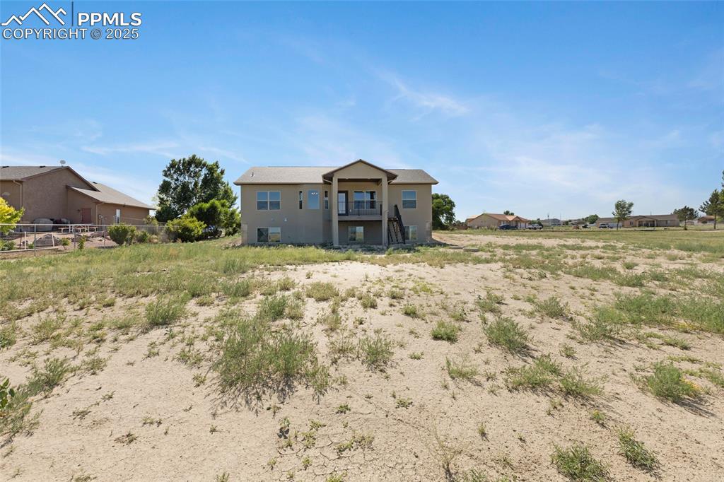Image 29 of 41: Rear view of house