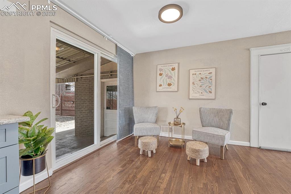 Image 13 of 50: Huge sliding doors to the backyard.