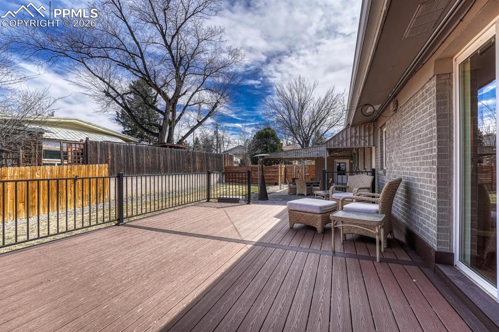 Image 24 of 50: Trek deck off the primary bedroom.