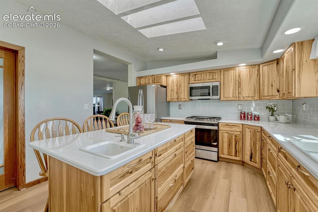 Image 12 of 50: New kitchen, new appliances, new cabinets with beautiful quartz counters