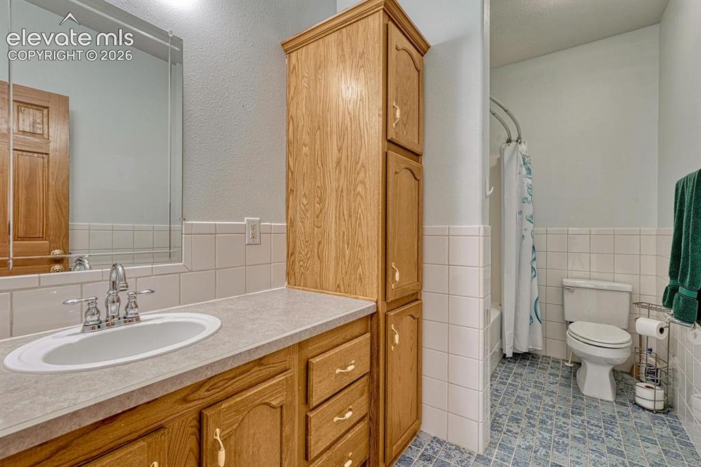 Image 19 of 50: Main level bathroom