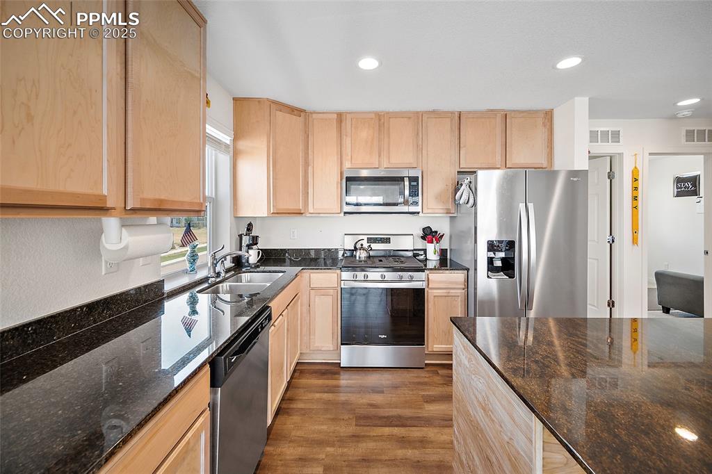 Image 12 of 38: Gorgeous Granite counter tops with plenty of space for cooking or rolling o