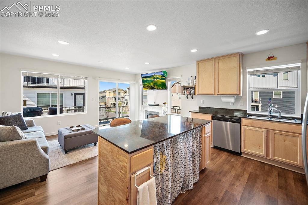Image 14 of 38: To the left of the window is added upgrade with extra cabinets. 