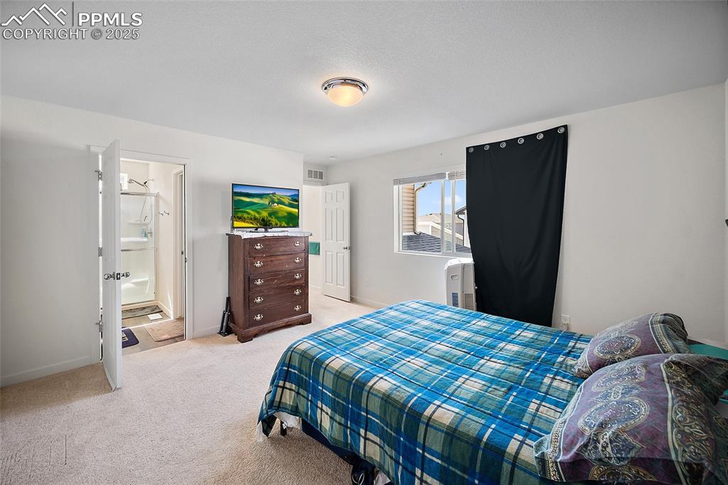 Image 19 of 38: Master Bedroom