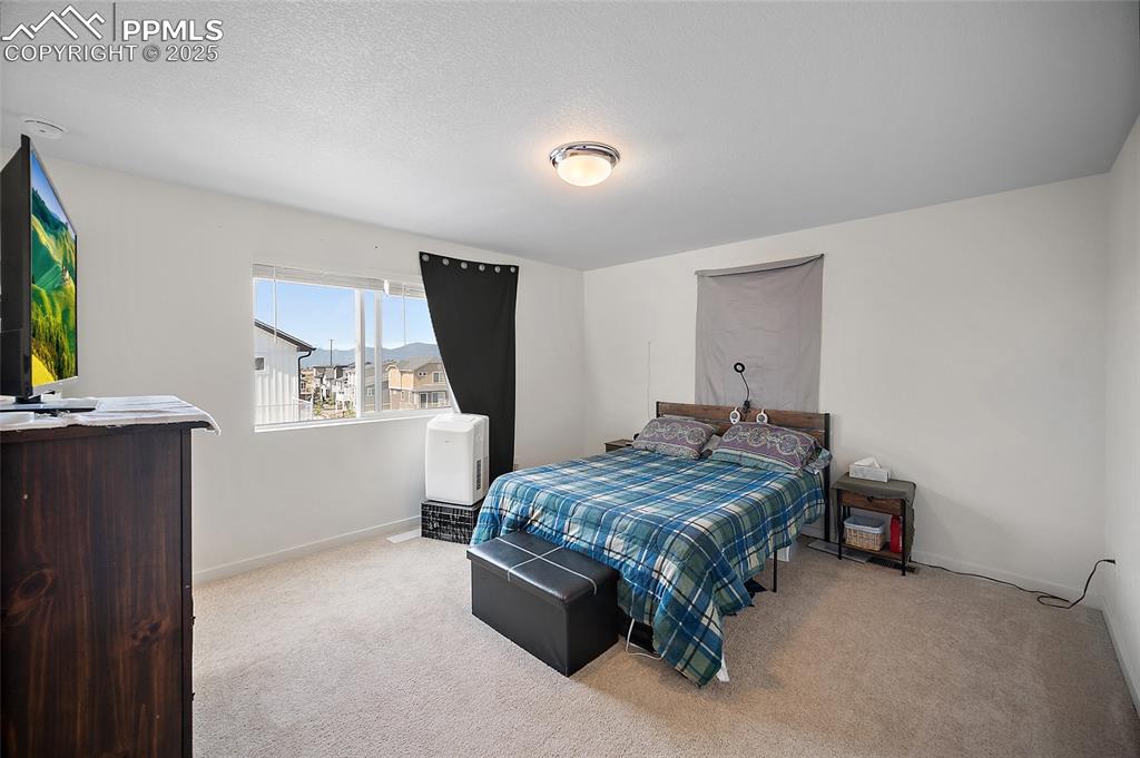 Image 20 of 38: Master Bedroom