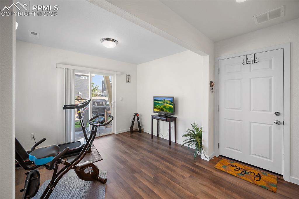 Image 8 of 38: Walk out to the patio, front door. 