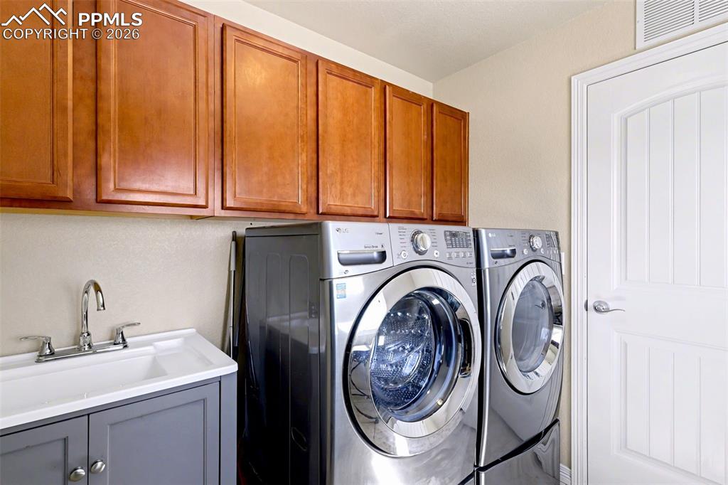 Image 19 of 43: Laundry conveniently located on the upper level, lots of space!