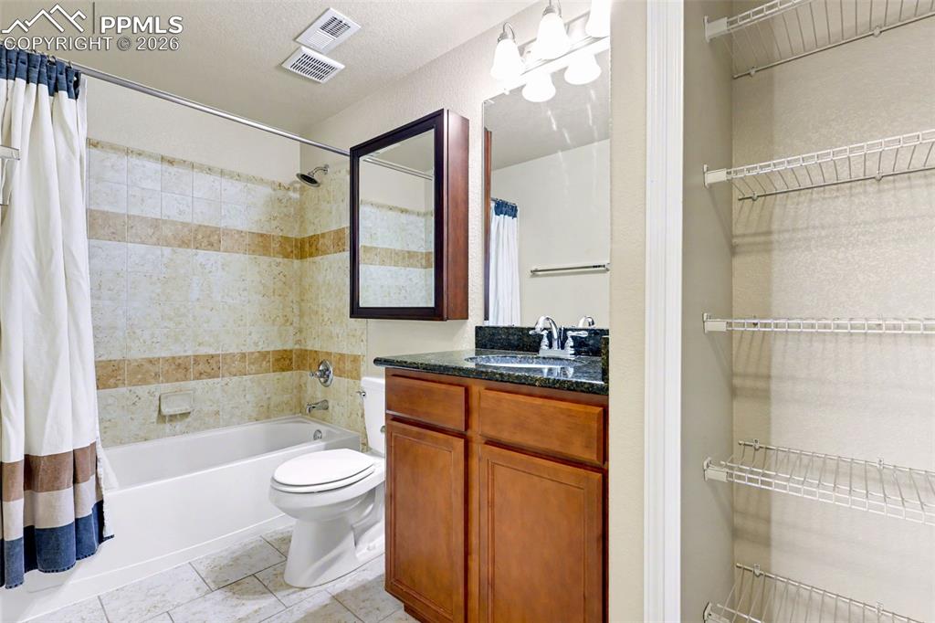 Image 27 of 43: Lower level full bathroom