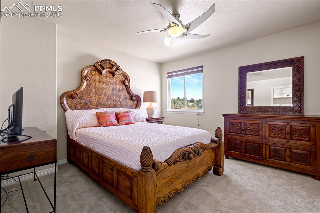 Image 32 of 43: Upper level additional bedroom