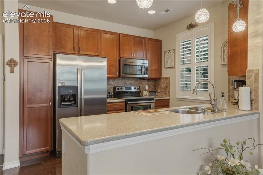 Image 10 of 47: Stone countertops.