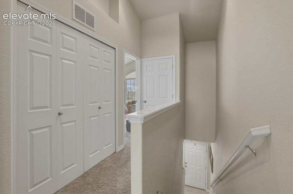 Image 36 of 47: Upper level hallway.