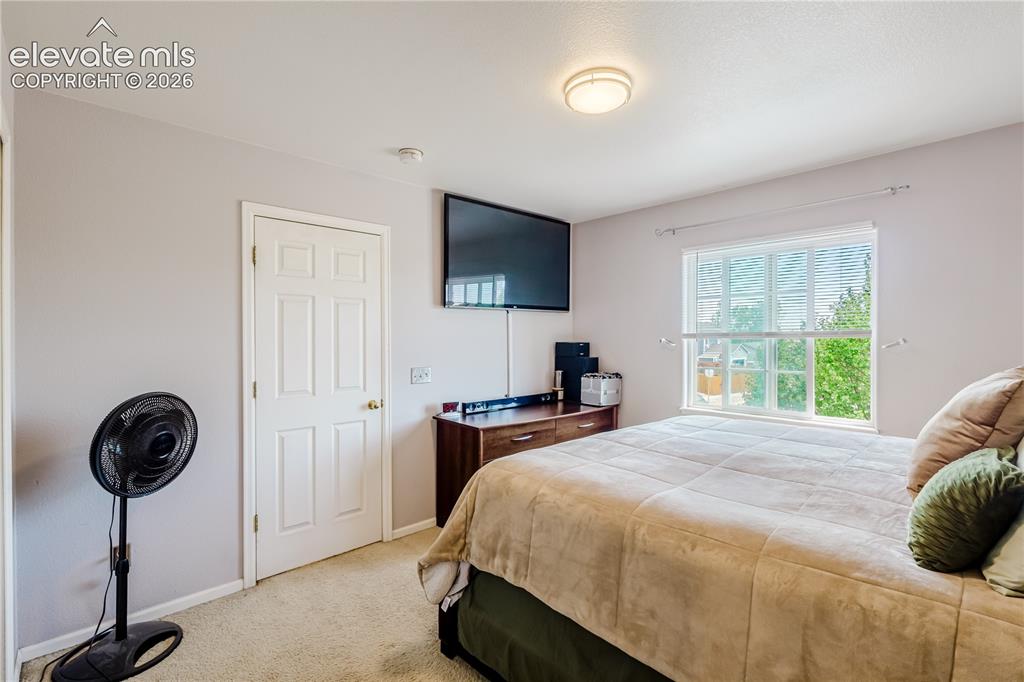 Image 19 of 29: Master Bedroom