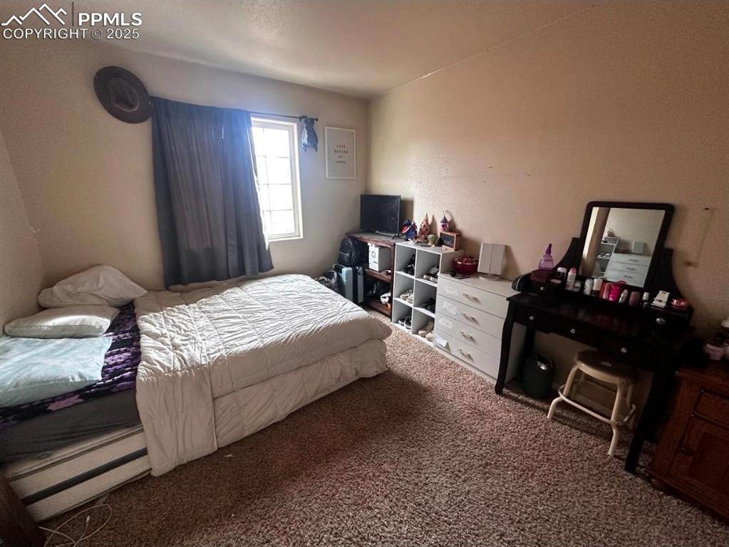 Image 18 of 21: View of carpeted bedroom