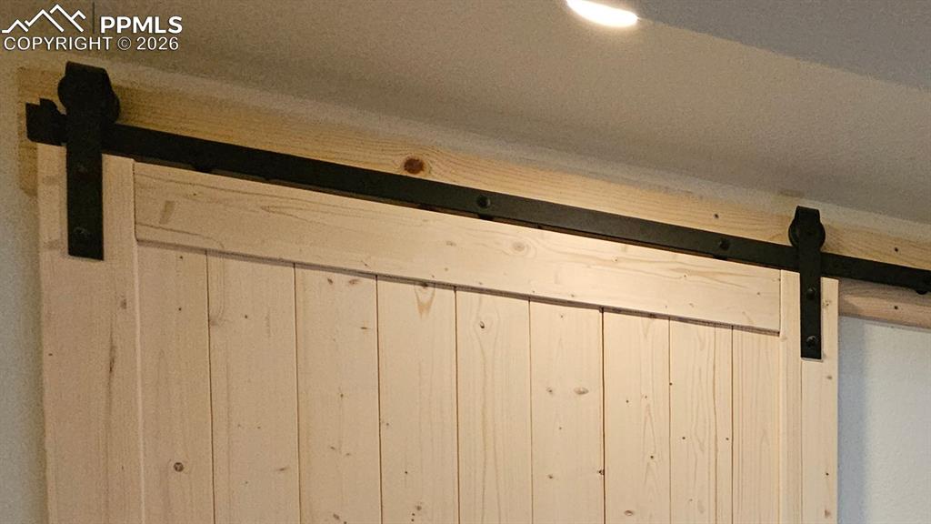 Image 10 of 41: Farmhouse Door to Lockers - Next Photo includes Lockers and Water Room 