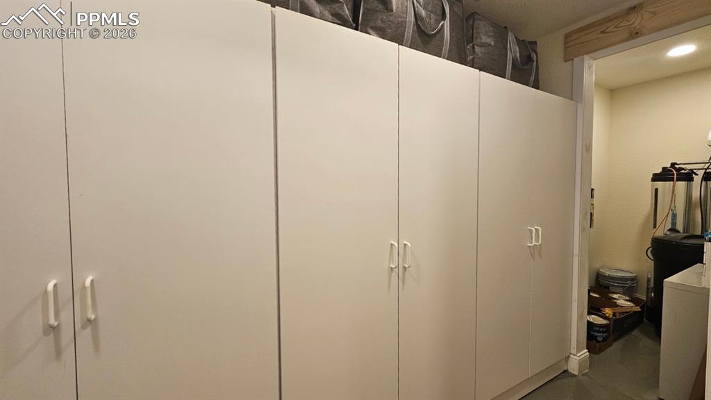 Image 11 of 41: Massive 25x6 Storage Lockers and Water room pass-through