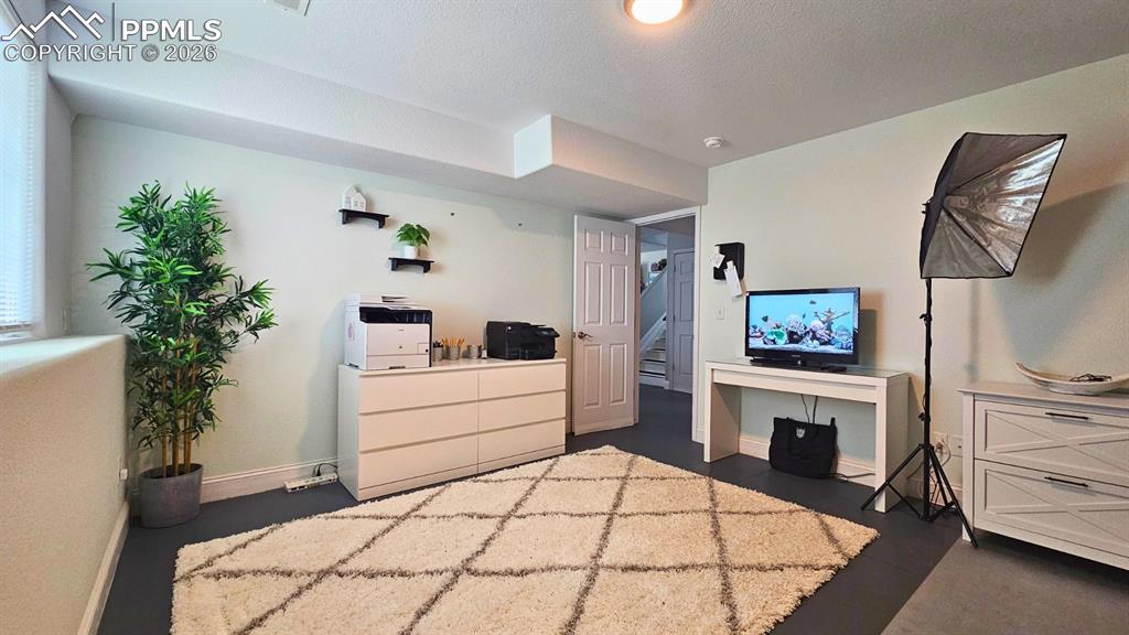 Image 17 of 41: Office / Bedroom 2 combo adding function with new floor finish