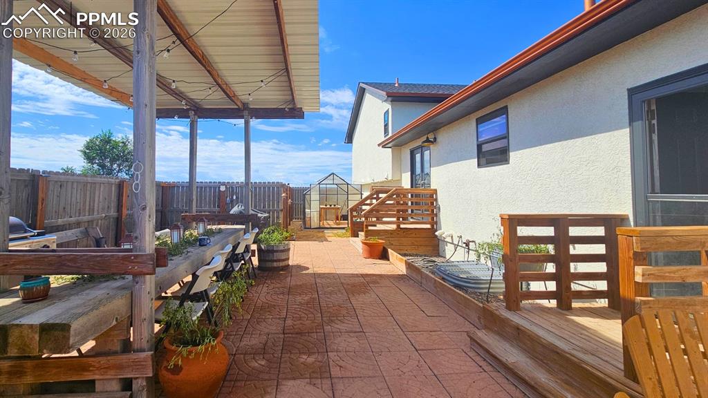 Image 28 of 41: Outdoor space facing Greenhouse 