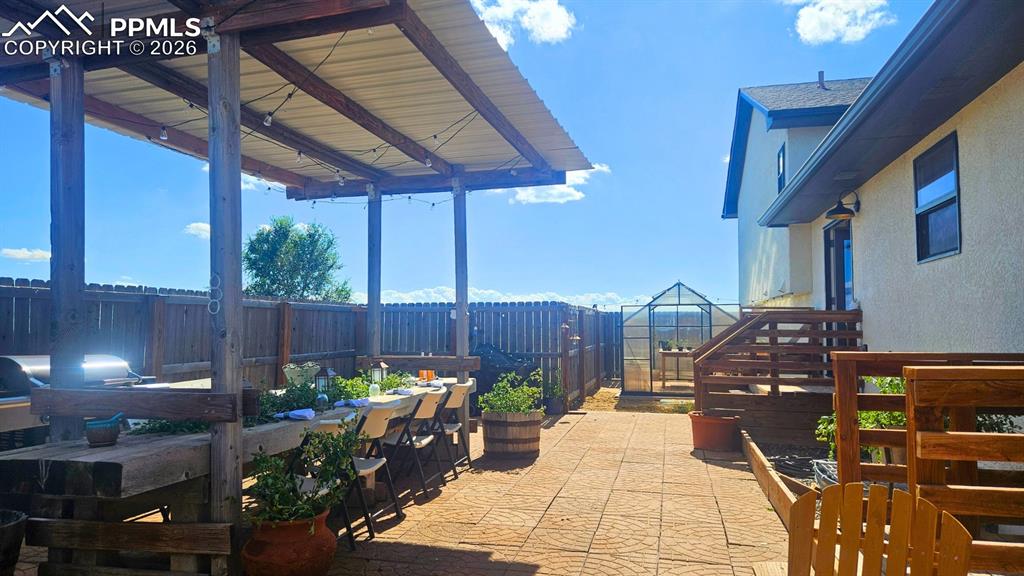 Image 32 of 41: Patio Walkway with plenty of room to stretch and enjoy.