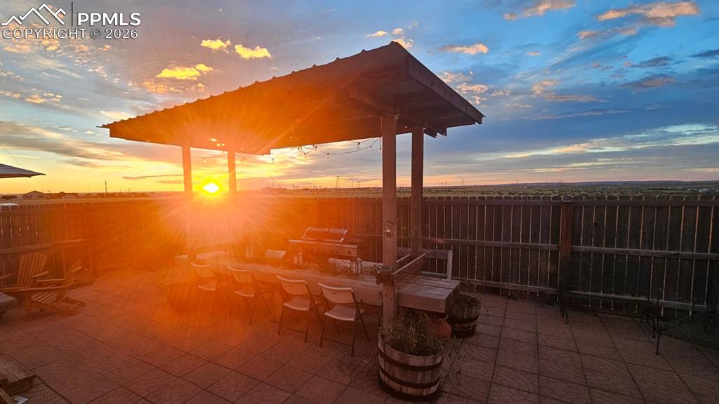 Image 34 of 41: East facing sun gives natural sunlight at back deck and kitchen