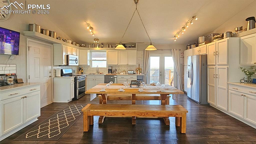 Image 5 of 41: Farmhouse Kitchen with Quartz Countertops, French Door, and Completely Upda