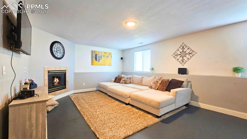 Image 6 of 41: Family room with view of the Fireplace