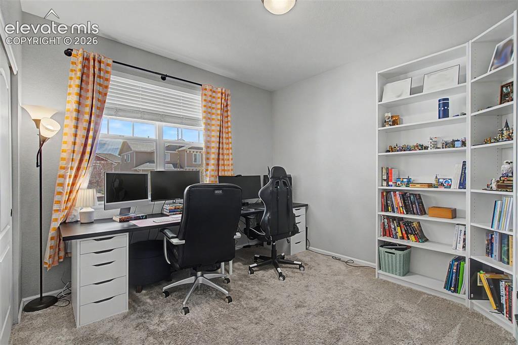 Image 16 of 46: Main level bedroom or office