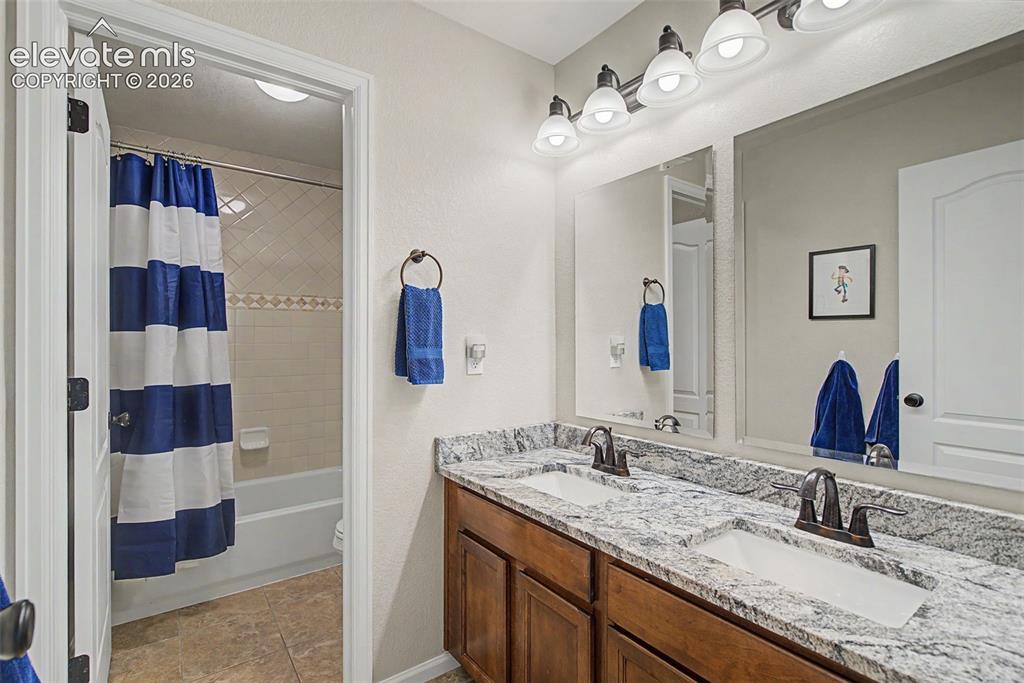 Image 25 of 46: Split design upper secondary bathroom