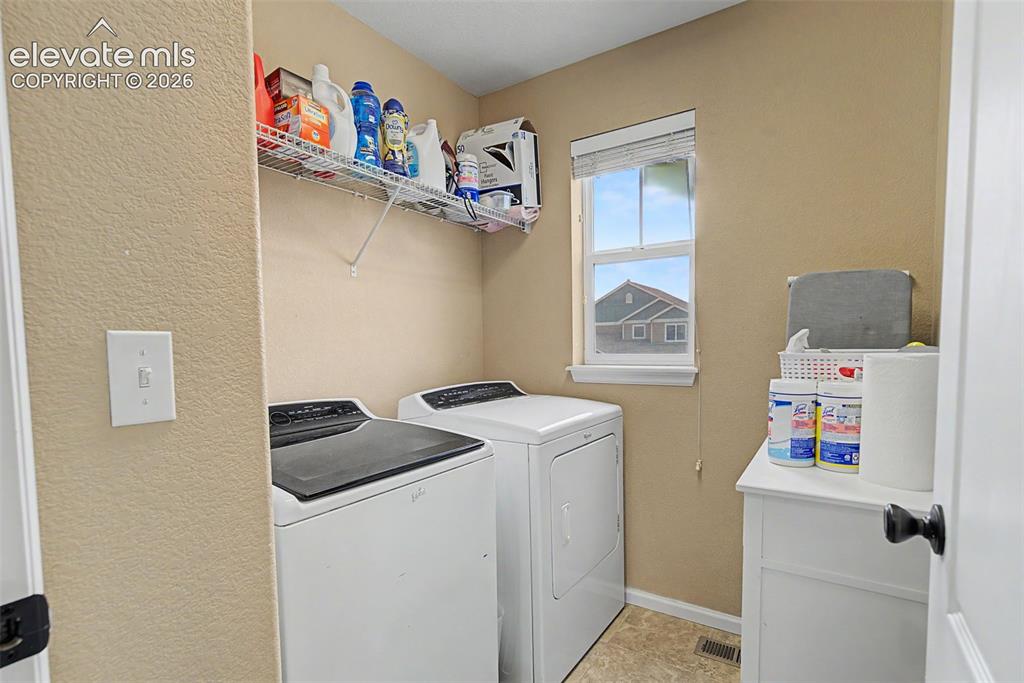 Image 27 of 46: Upper Laundry room