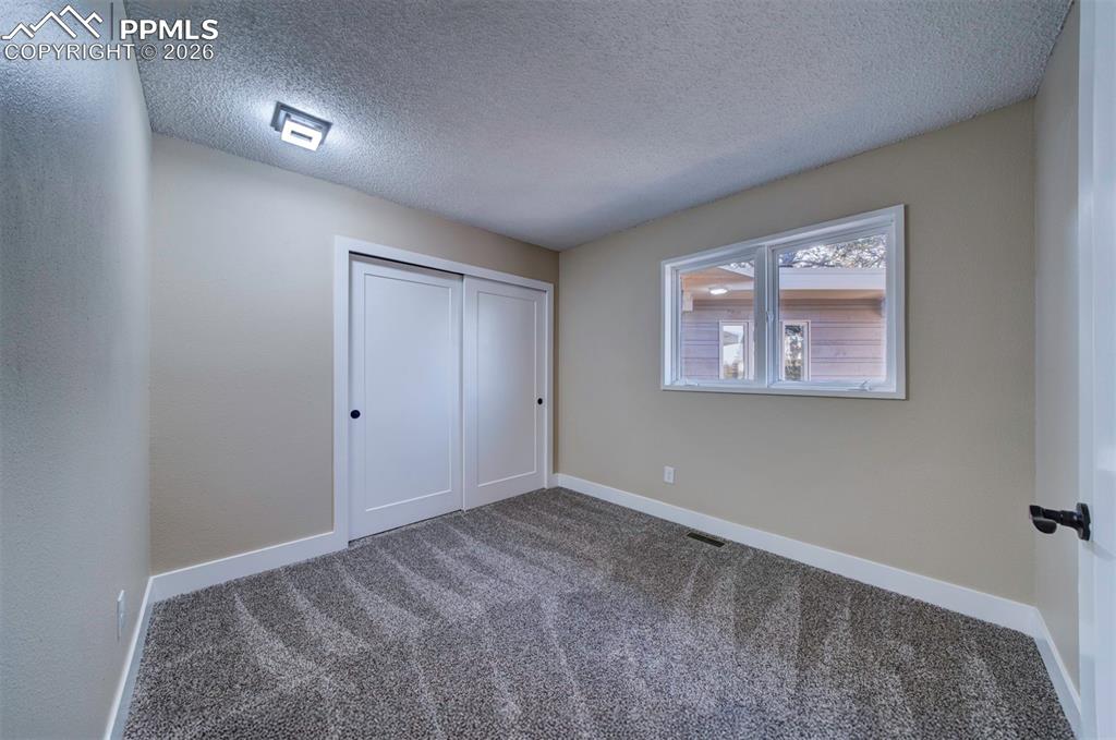 Image 32 of 49: Bedroom