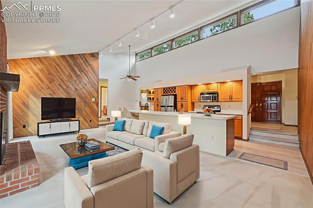 Image 6 of 48: Virtually Staged. A huge open space with roomy kitchen and cozy living room