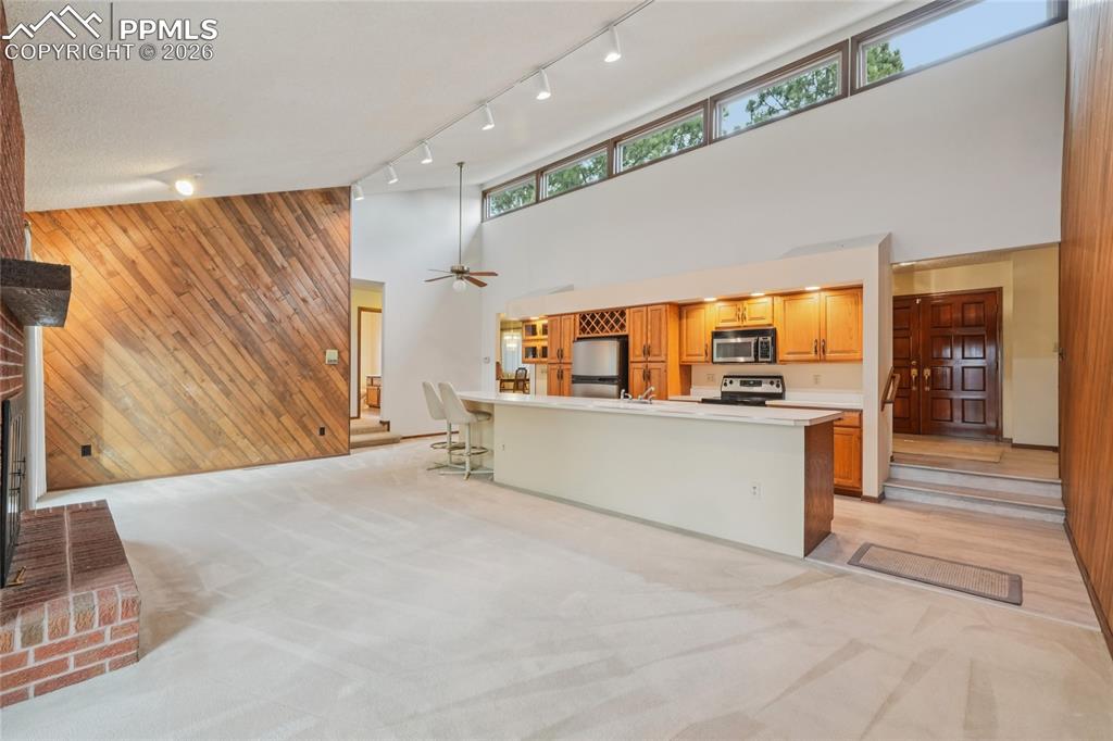 Image 7 of 48: Add eat-in dining to either side of the huge living room space.