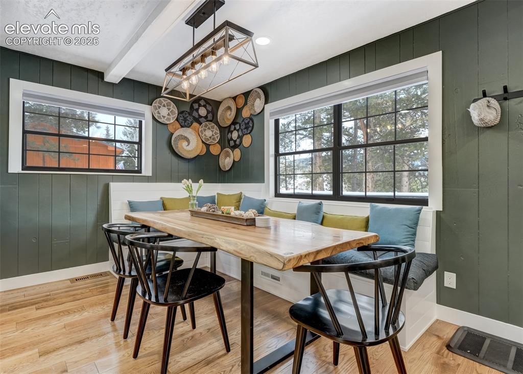 Image 11 of 49: A wide open floor plan allowing the whole family to enjoy meals together an