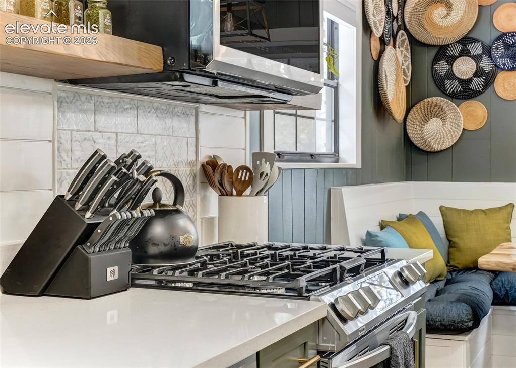 Image 16 of 49: Where all the memories begin during the holidays. This kitchen has lots of