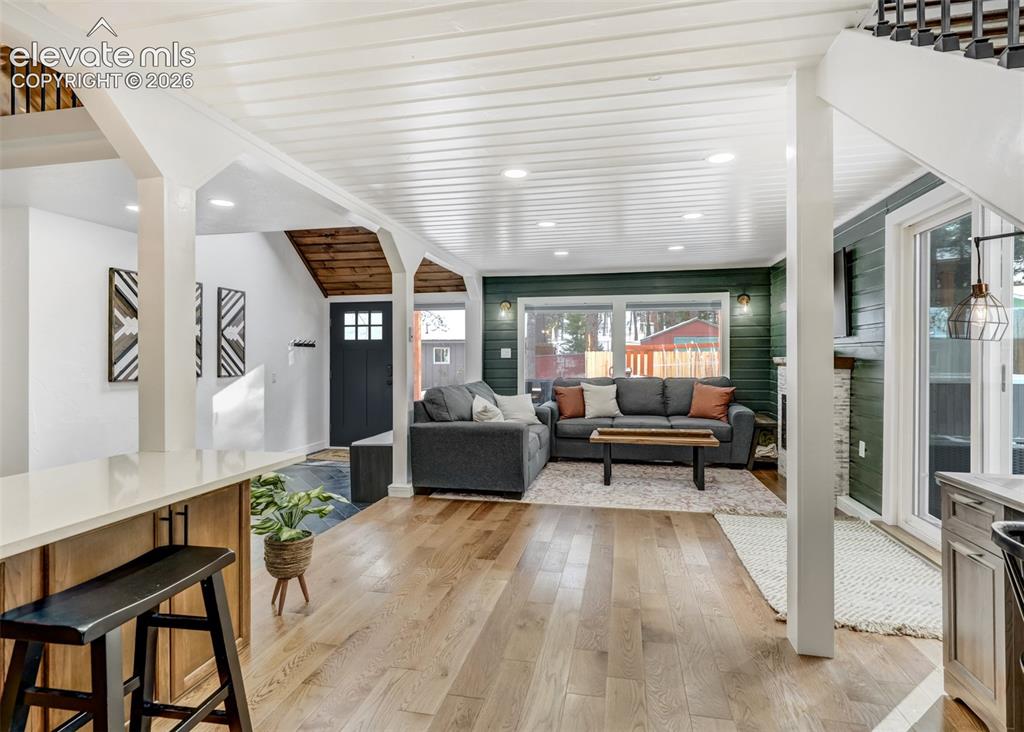 Image 31 of 49: This bonus room is a great area to enjoy when having company over and creat
