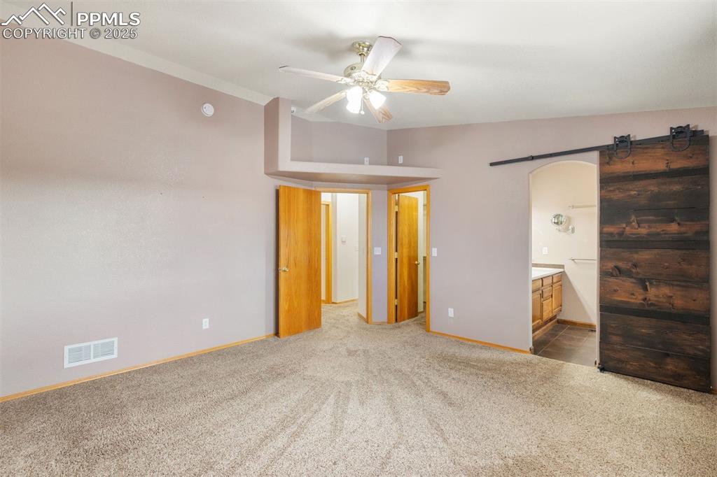 Image 14 of 41: Master Bedroom