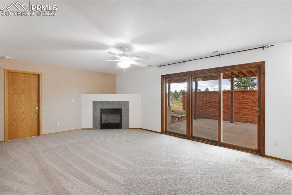 Image 24 of 41: Cozy fireplace in basement