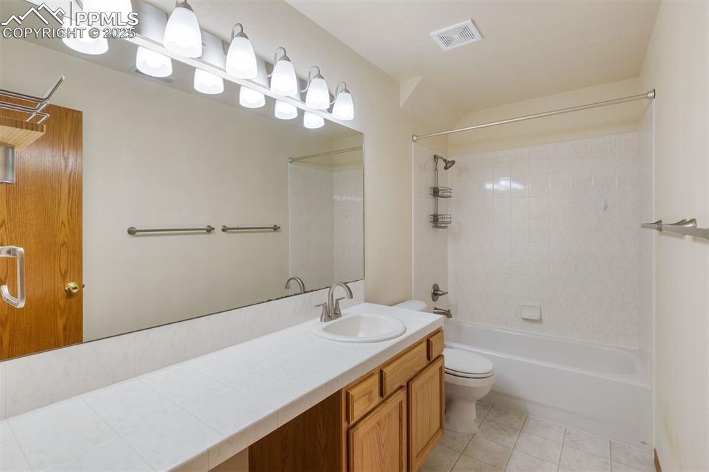 Image 26 of 41: bathroom located in basement