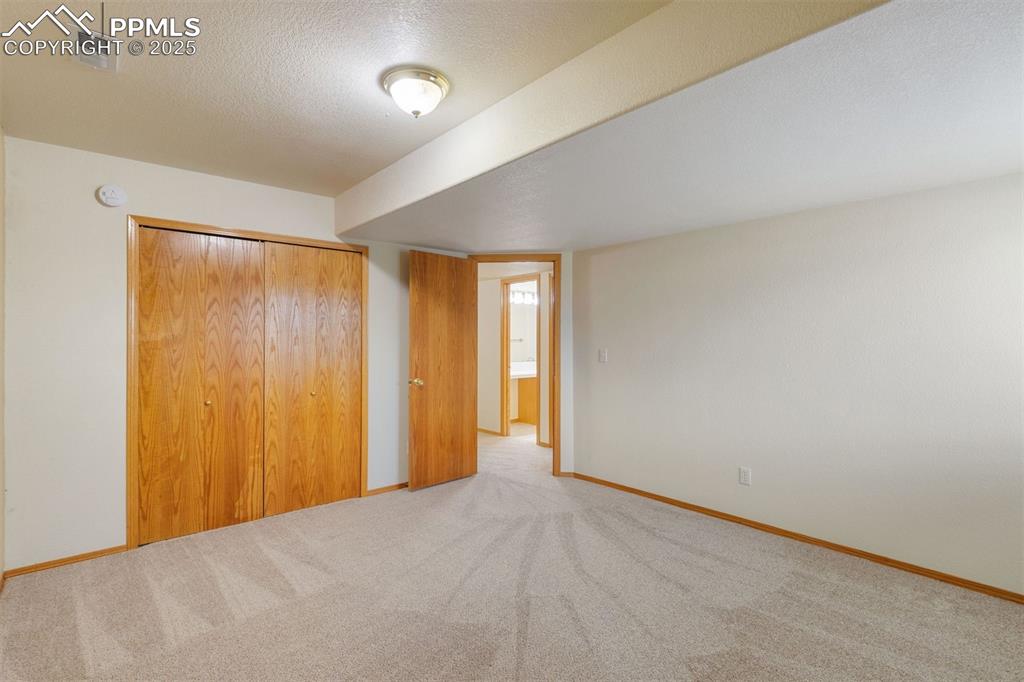 Image 28 of 41: bedroom located in basement