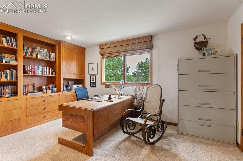 Image 22 of 49: This office could be an additional bedroom