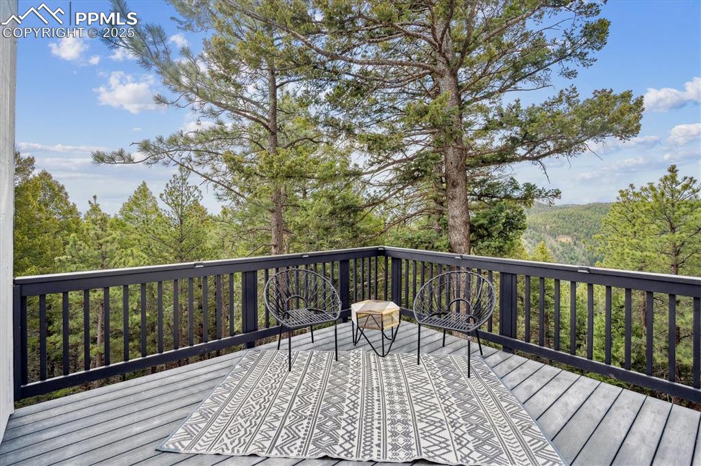 Image 25 of 44: Deck with a forest view