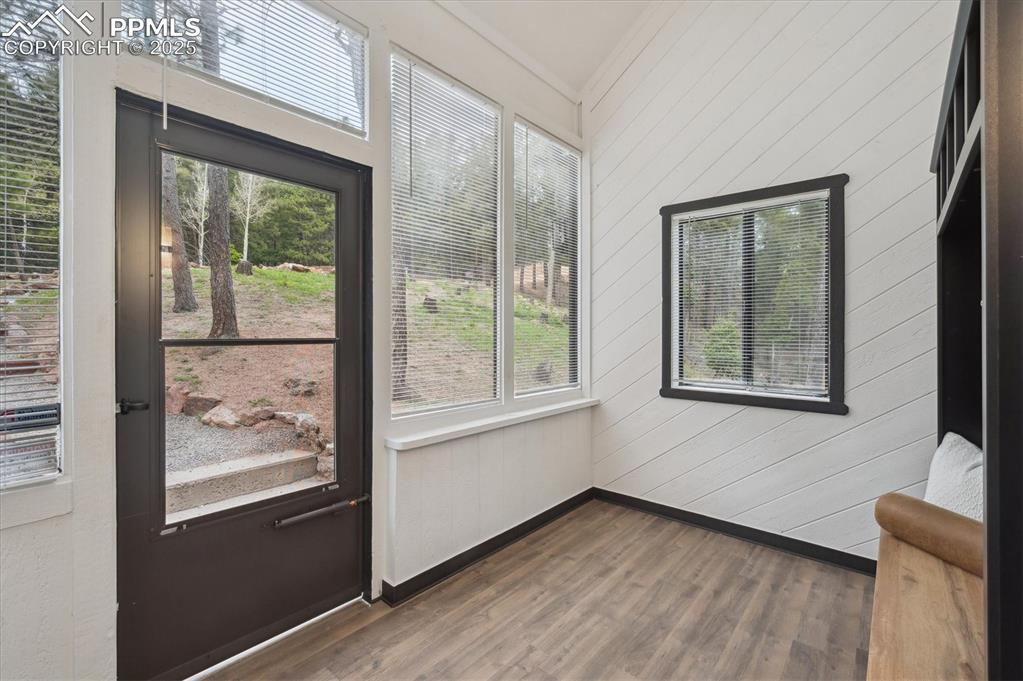 Image 34 of 44: Unfurnished sunroom featuring plenty of natural light