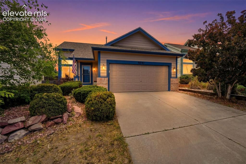 Image 1 of 30: Single-story residence featuring a two-car garage and a concrete driveway