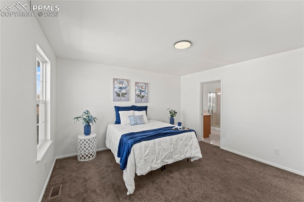 Image 12 of 25: Master Bedroom