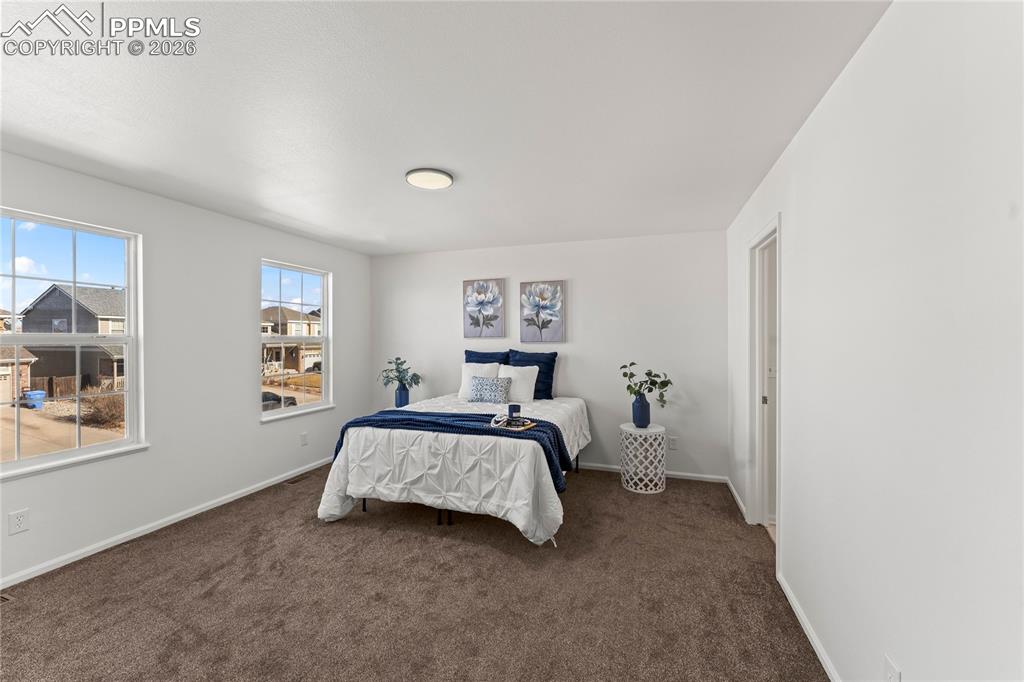 Image 13 of 25: Master Bedroom