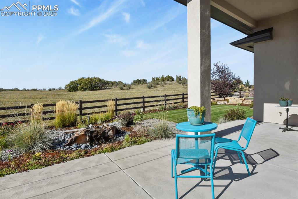 Image 40 of 50: Enjoy the peaceful private backyard that backs to open space and has a calm