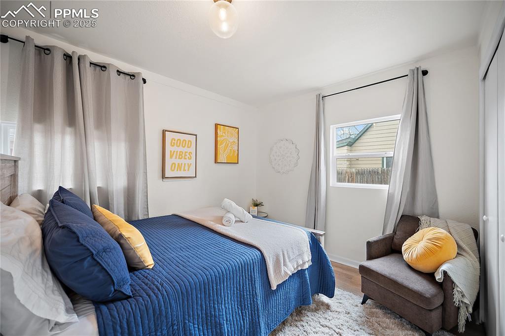 Image 13 of 47: Bedroom featuring wood finished floors