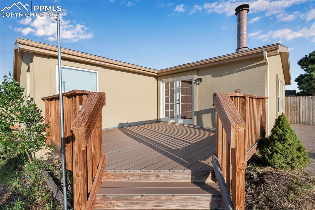 Image 5 of 46: Deck featuring french doors
